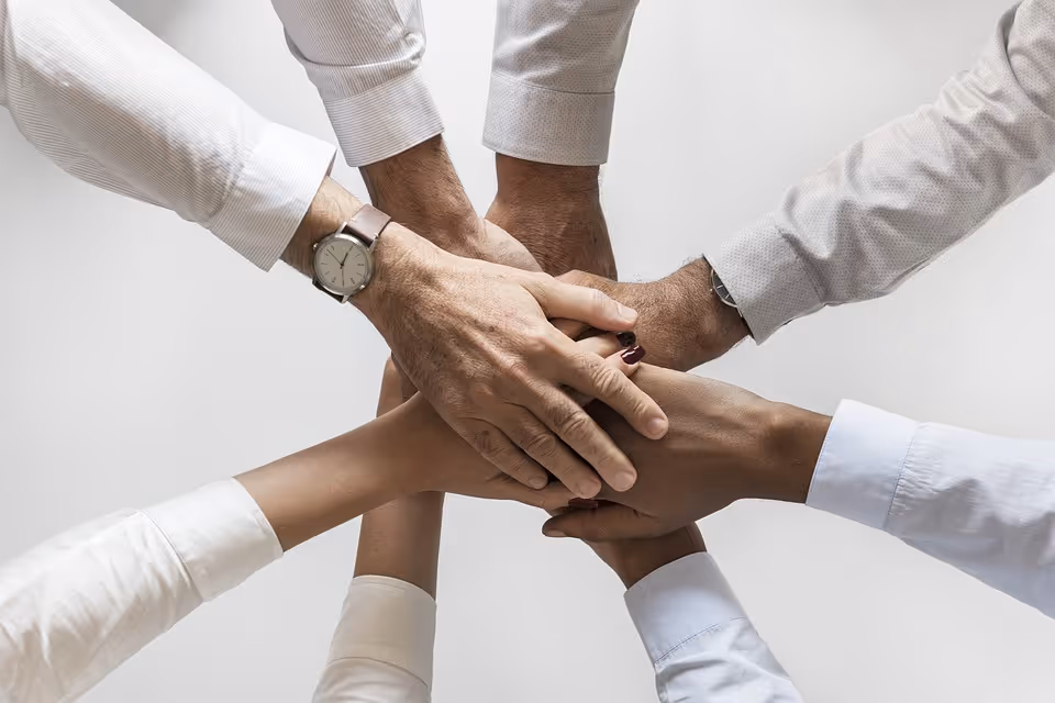 photo of many hand one on top of each other